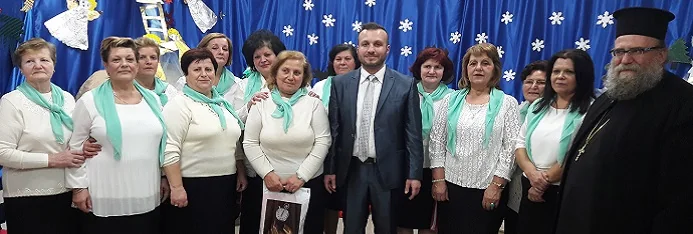 Petros Nikitas with members of his choir and a clergyman